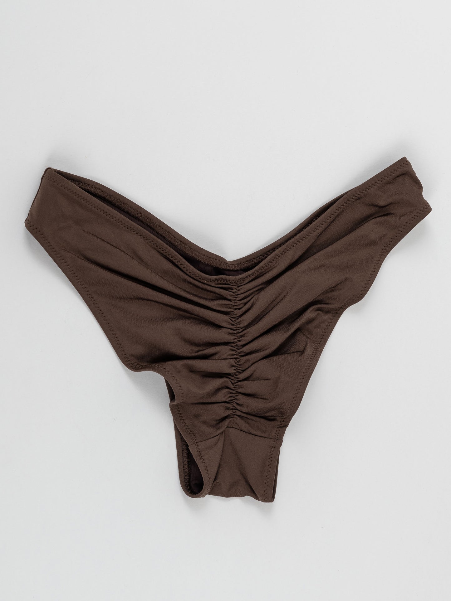 Brown pole dance shorts with ruched back detail on white background