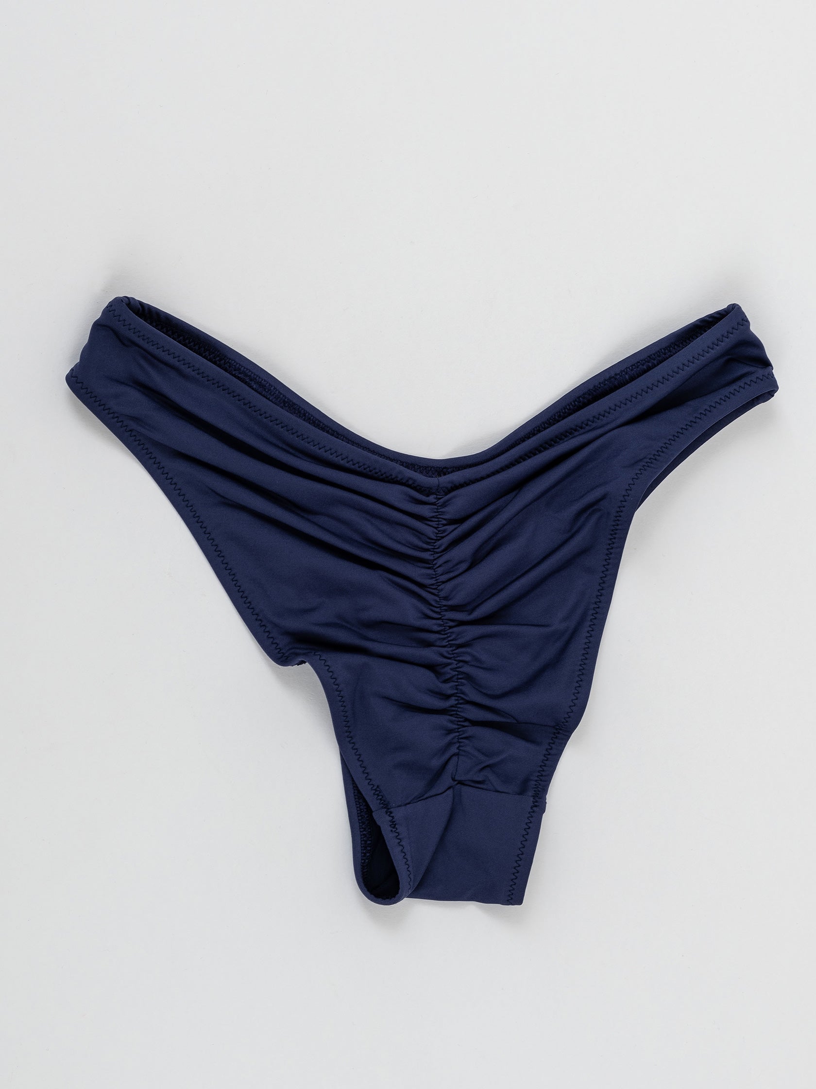 Blue pole dance shorts with ruched back detail on white background