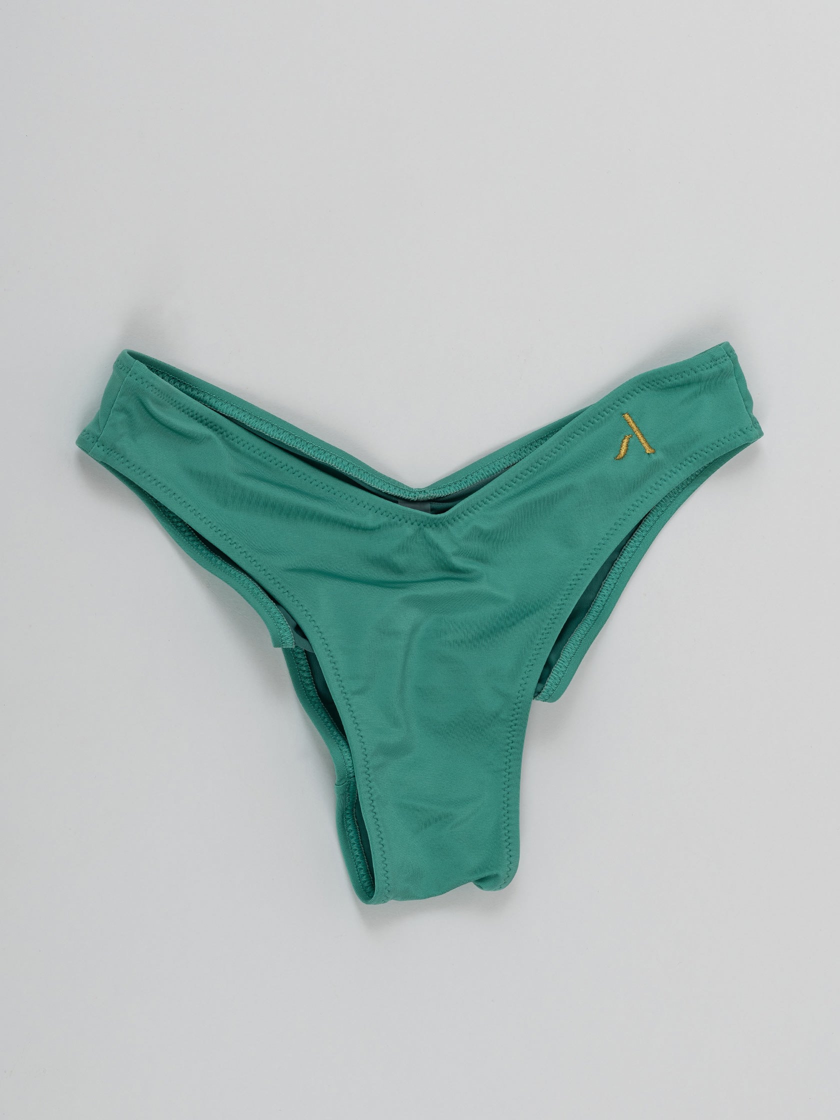 Pantaloncini slip da pole dance verde con arricciatura sul retro