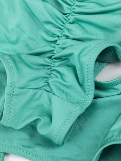 Pantaloncini slip da pole dance verde con arricciatura sul retro