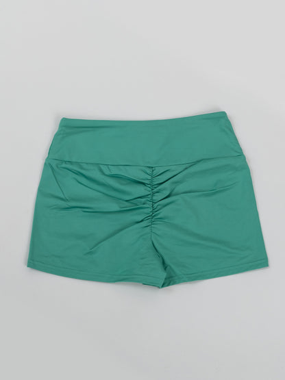 Pantaloncini da pole dance verde con arricciatura sul retro