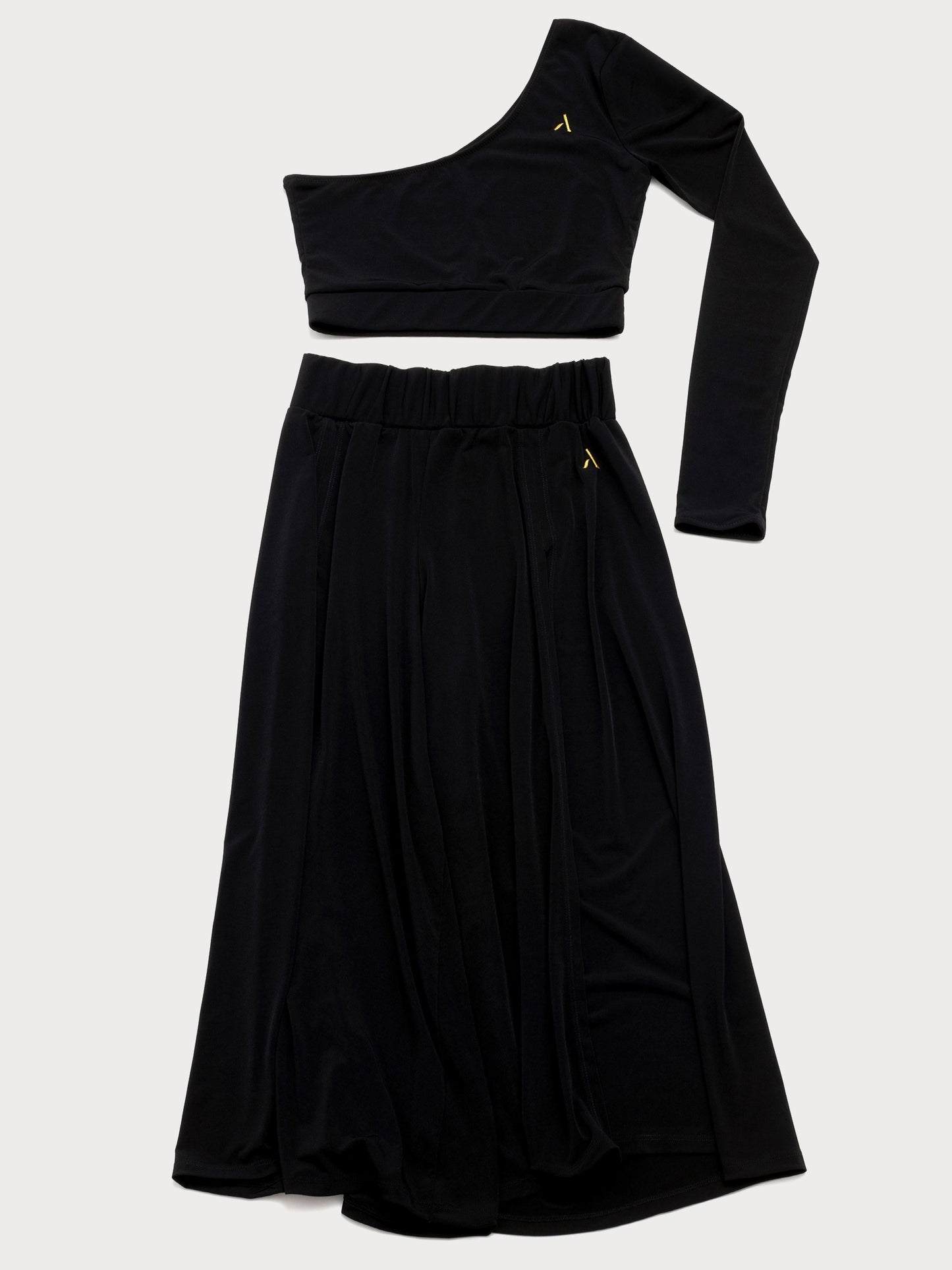 Set da pole dance, top monospalla e pantaloni culotte in jersey color nero