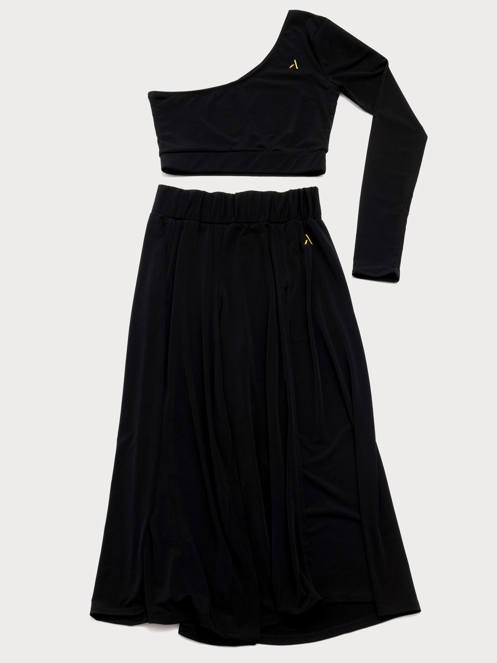 Set da pole dance, top monospalla e pantaloni culotte in jersey color nero