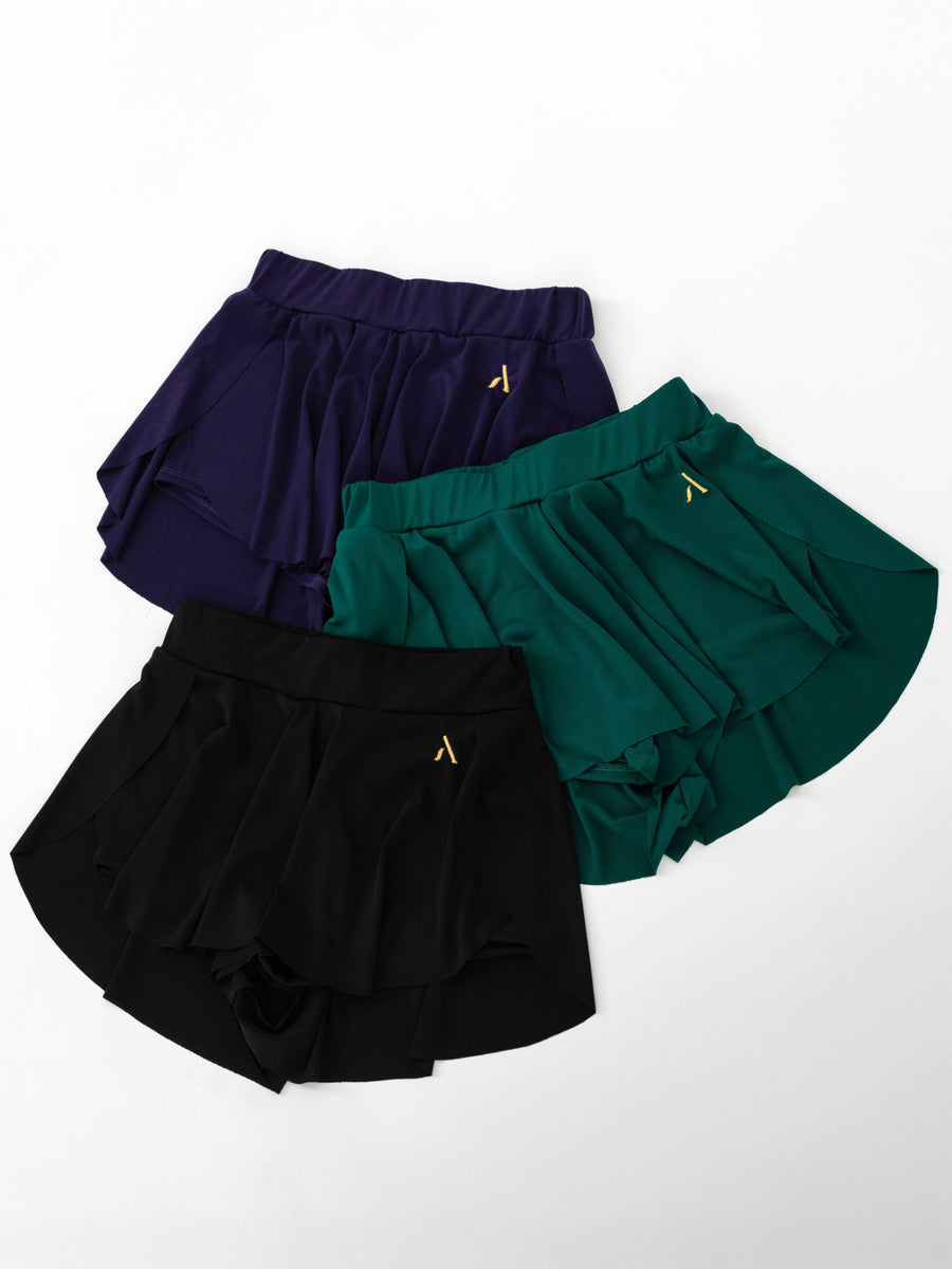 Tre gonne-pantaloncino da pole dance, colore viola verde nero